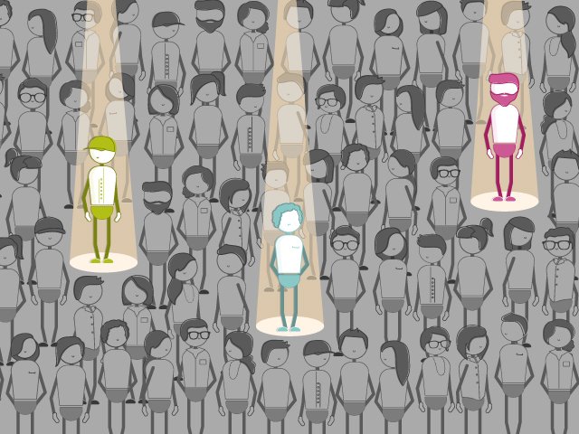a large group of employees with spotlights on three of them to show finding your influencers